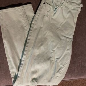 Mint green Old Navy Rockstar pants, mid-rise.